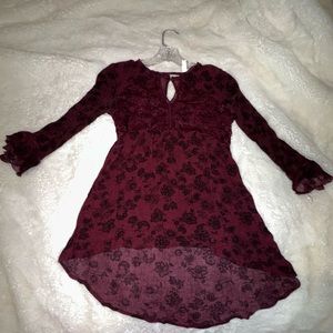 Burgundy shirt, long sleeves with lace detail, size small and brand xhilaration.